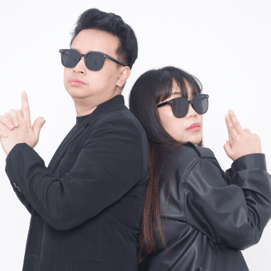 Group of 5 women wearing white and light blue posing smiling